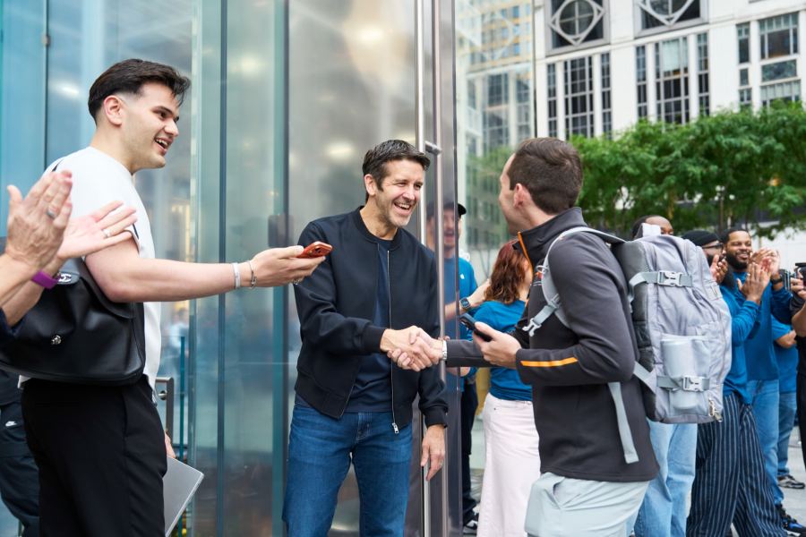John Ternus greets customers at Apple Fifth Avenue during the iPhone 18 Pro launch