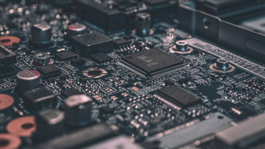 Circuit-board close-up — the physical substrate that still runs so much of the software stack