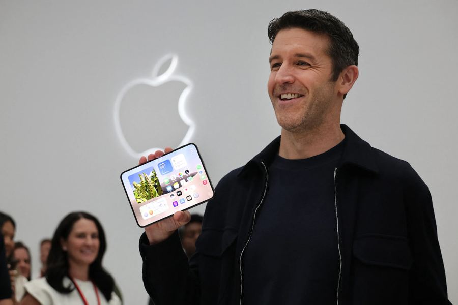John Ternus holding the iPhone Duo, the product that defined his first major event as CEO.