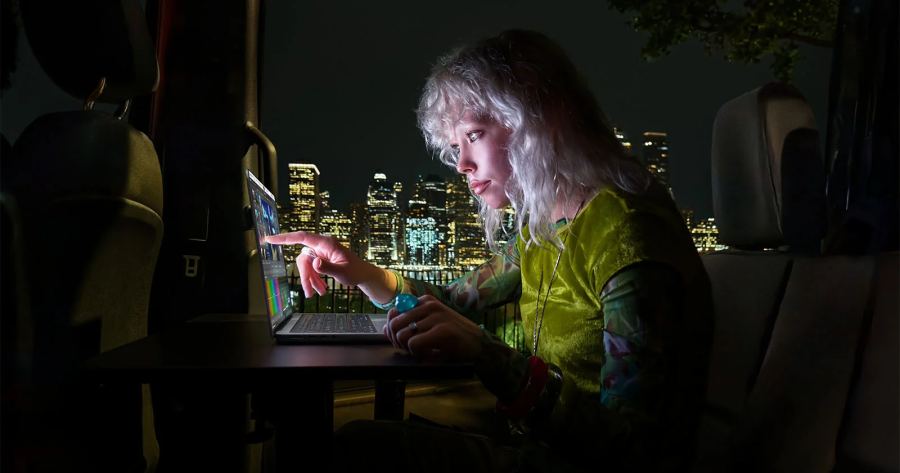 Touch arrives on Mac: a user interacts directly with the PROLED XDR display.